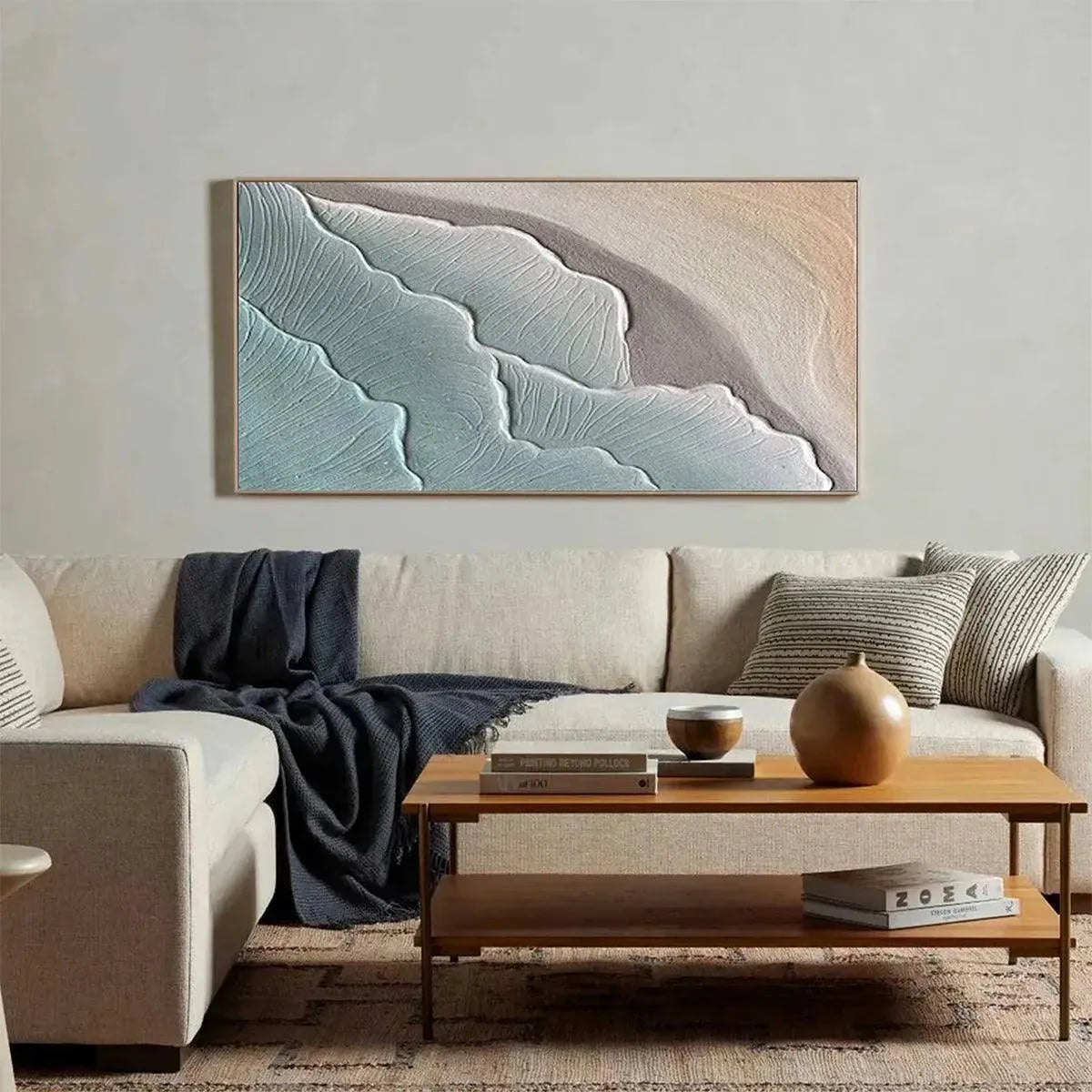 Emerald Waves abstract painting, textured teal seascape art above a cream sofa, modern home decor by Liam O'Connell.
