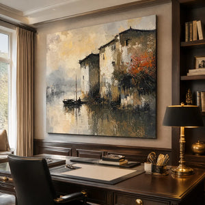 Misty European cityscape oil painting above a modern office desk.