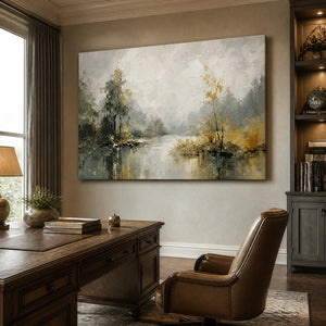 Hand-painted abstract lake landscape oil painting featuring rich palette knife texture in grey and gold tones, displayed in a sophisticated home office setting with a dark wood desk.