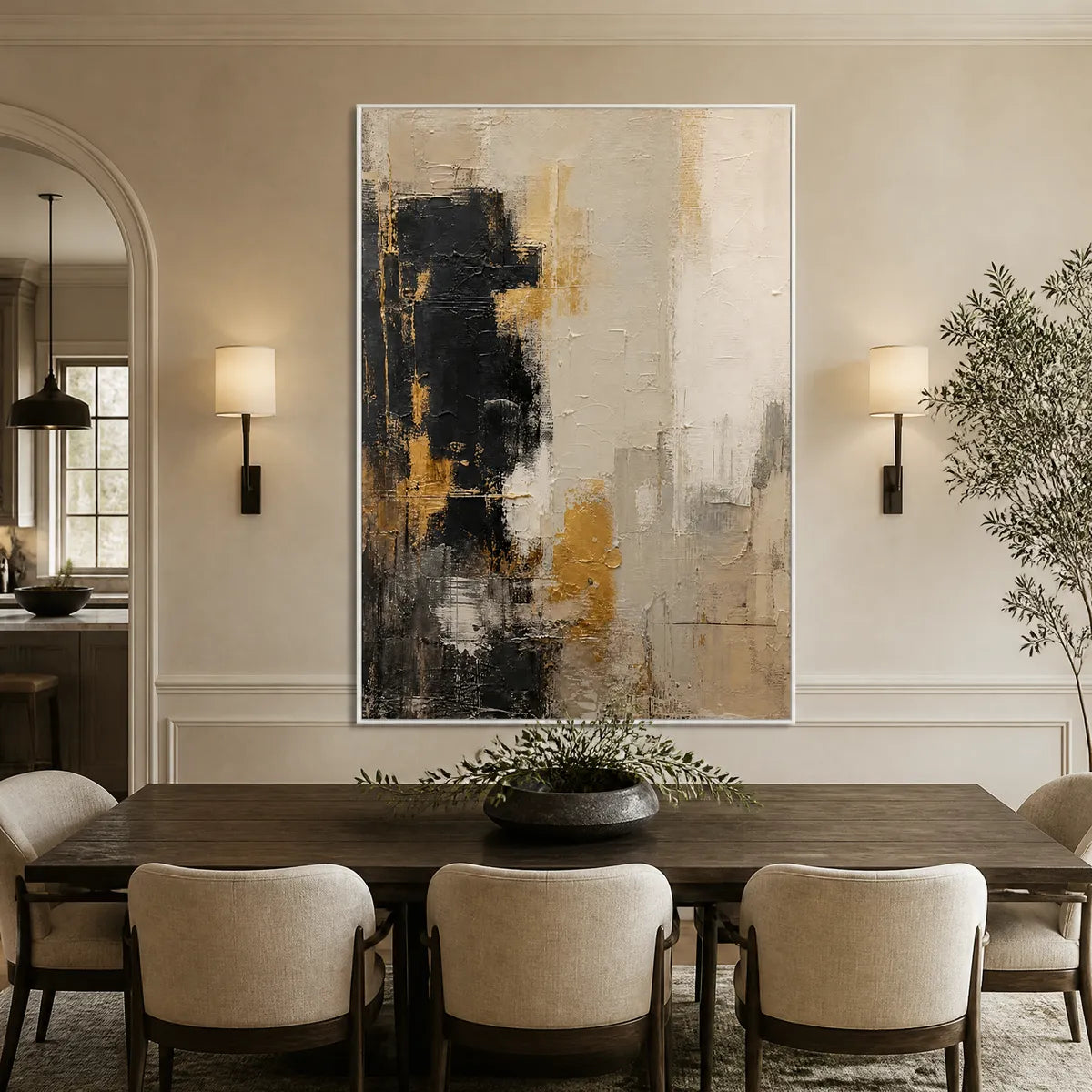 Black white gold abstract wall art above a luxury sofa in a modern living room.