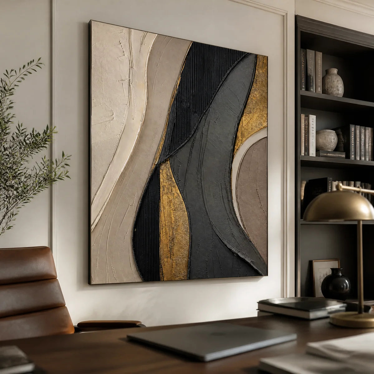 Black gold geometric abstract wall art in a luxury modern office.