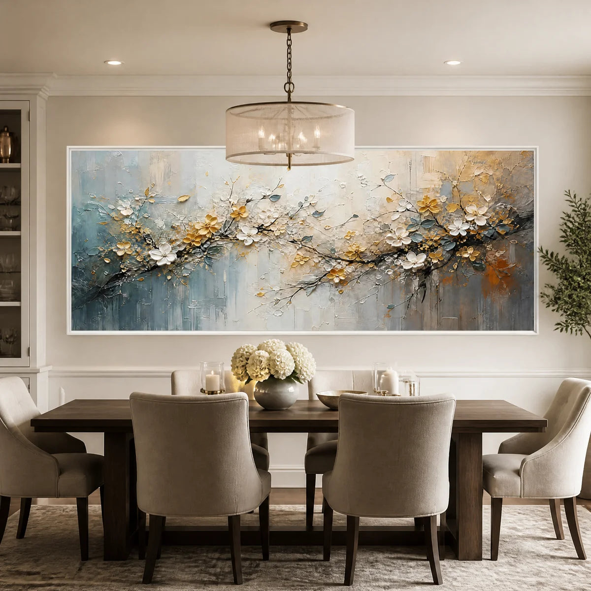Textured abstract flower canvas art featuring raised palette knife strokes, hanging in a bright dining room.