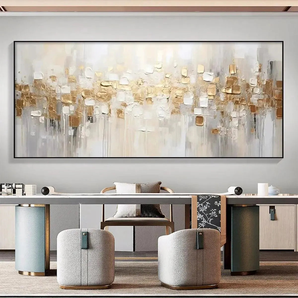 Horizontal gold and white impasto abstract painting with textured squares, displayed in a modern room to show scale.