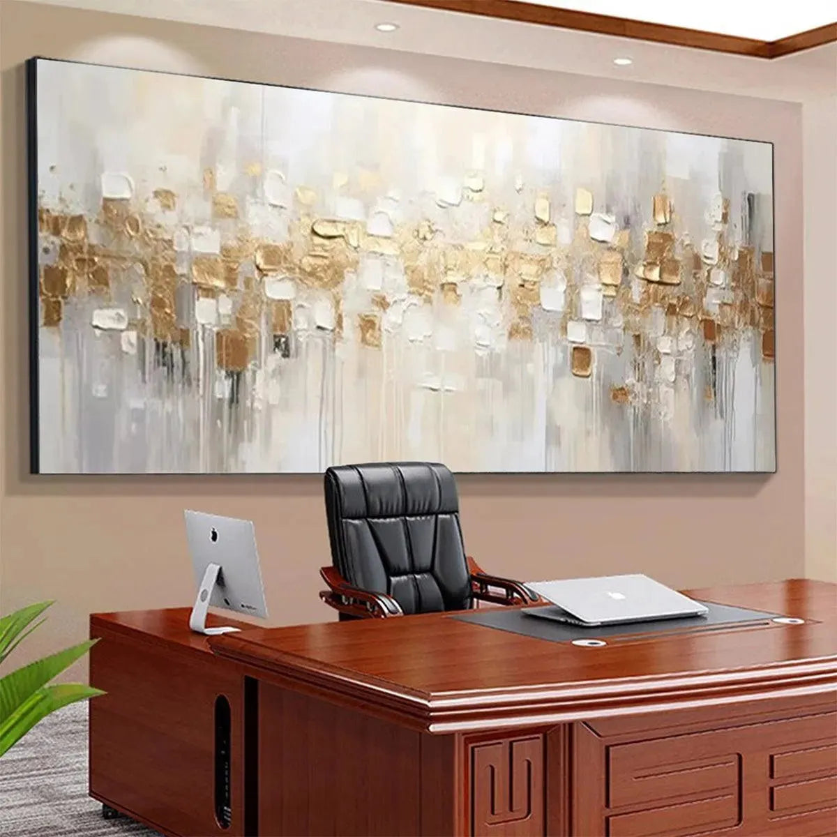 Textured gold and white abstract impasto painting with dripping lines, shown in an office for scale.