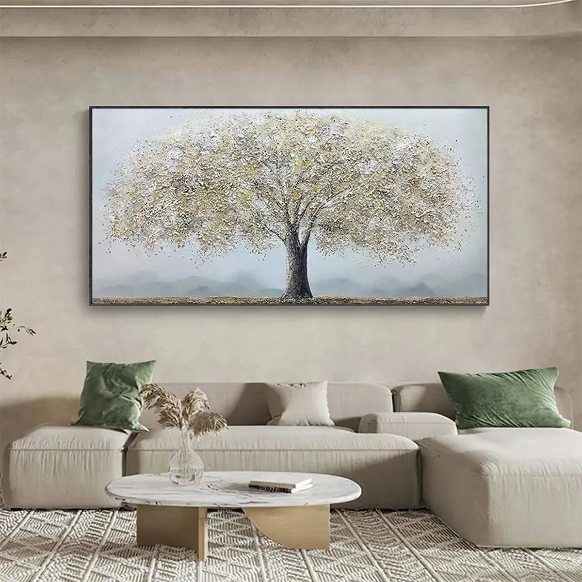 Golden Tree painting by Javier Ramirez, textured gold and grey, above a modern sofa. Modern home decor.