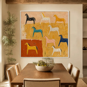 Framed colorful horse pattern painting with abstract folk-inspired horses in a beige living room.