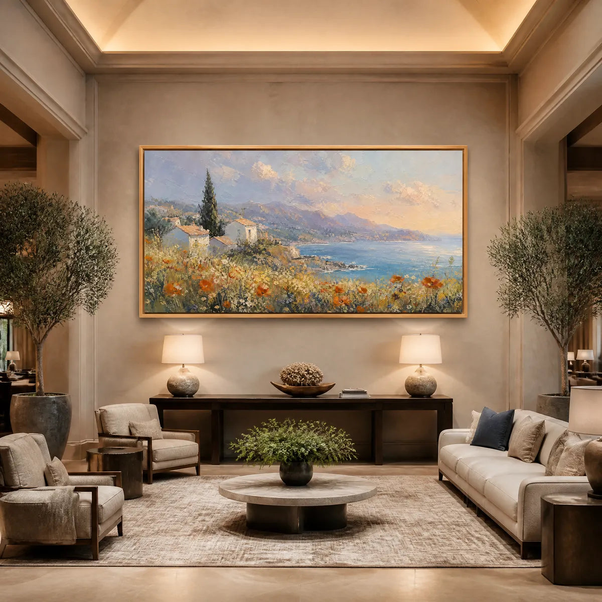 Framed coastal oil painting with poppies and houses, mounted on the wall of a transitional living room.