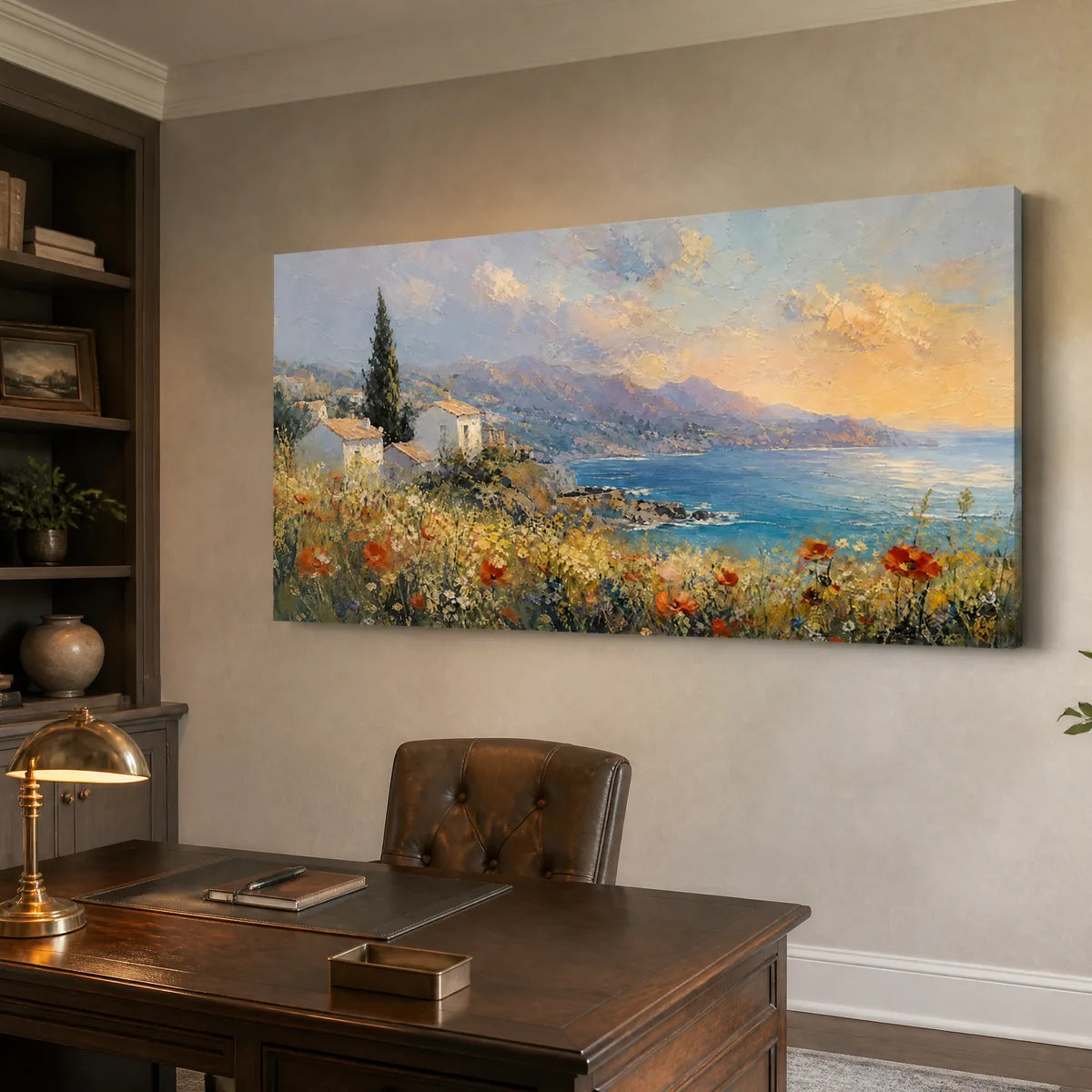 Textured canvas art of a Mediterranean seaside village, hanging above a professional home office desk.