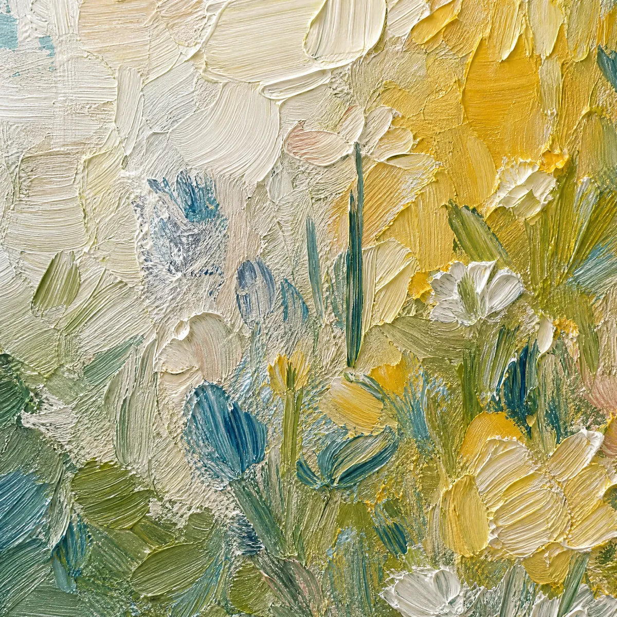 Textured impasto oil painting of a wildflower field in white, yellow, green and blue