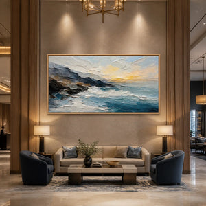 Textured oil painting of stormy ocean waves in blue-gray tones displayed in a luxury hotel lobby.