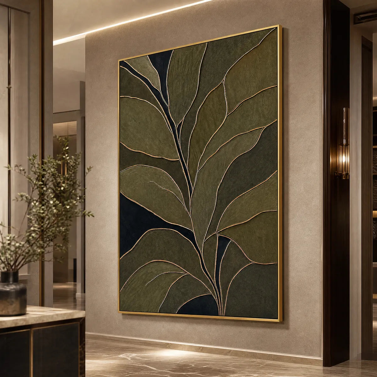 Textured botanical abstract painting in olive green with gold vein lines in a modern gold frame