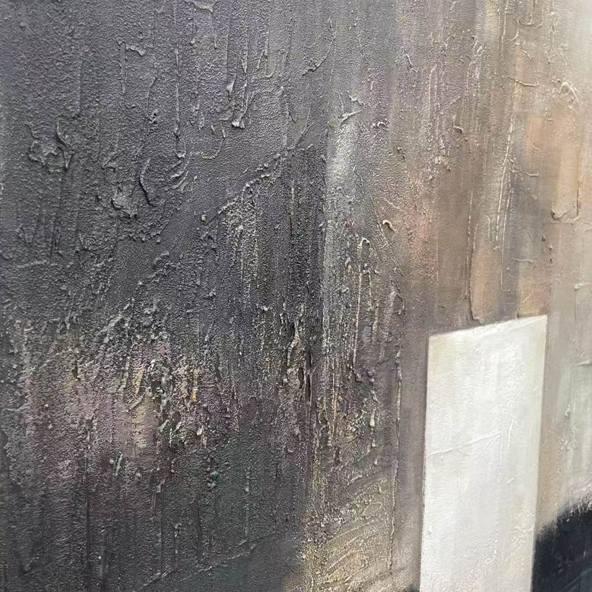Textured abstract painting with charcoal, beige, and brown hues, featuring a white rectangular element. Vertical wall art.