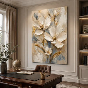 White magnolia floral oil painting with gold accents in a modern luxury office.