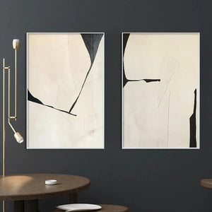 Minimalist abstract diptych with beige canvases, bold black lines, and subtle grey strokes evoking movement and balance.