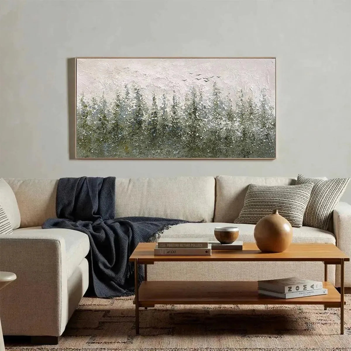 Misty Forest horizontal textured landscape painting above cream sectional sofa in modern living room.