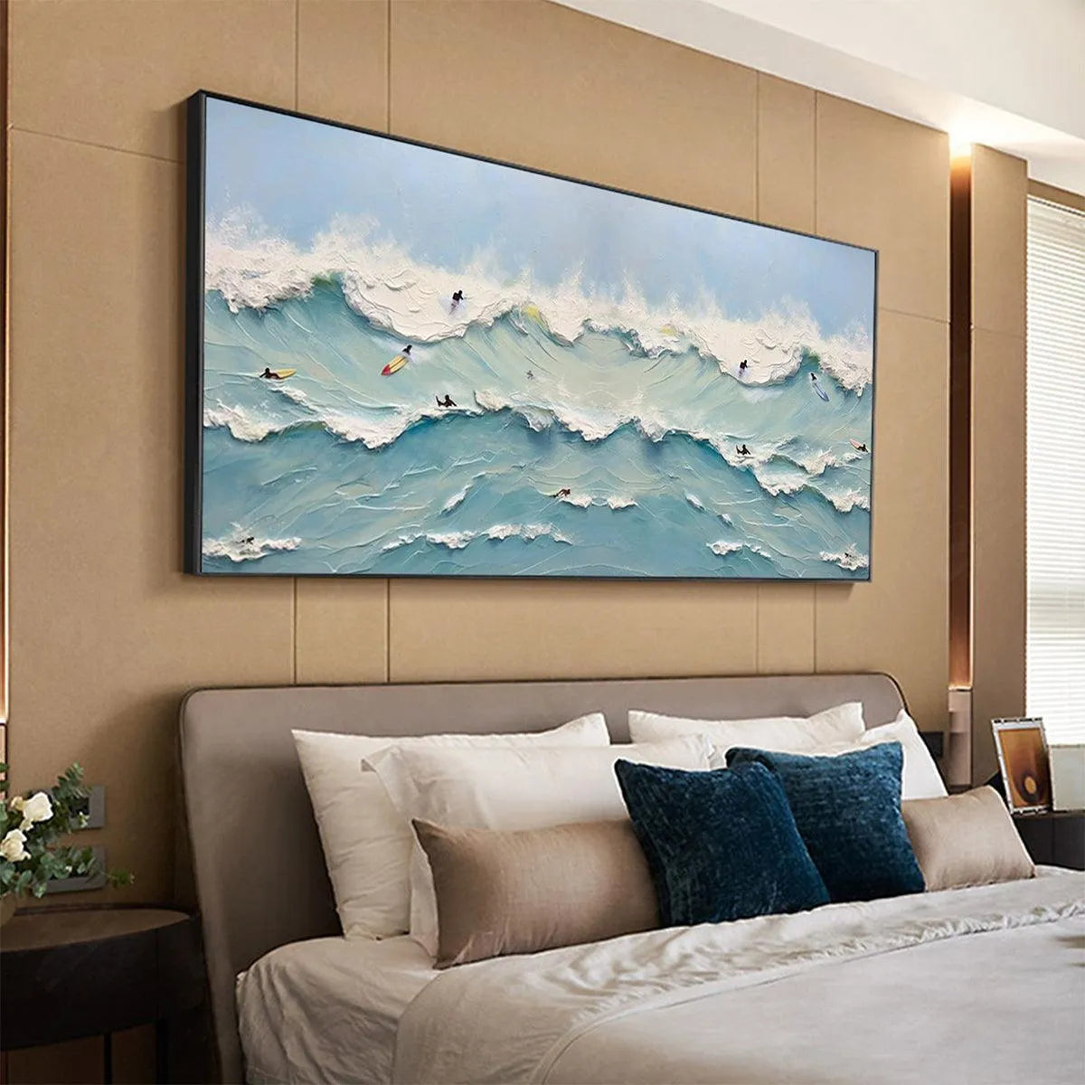 Ocean's Heartbeat panoramic wave painting by Liam O'Connell with surfers, framed, displayed in a bedroom setting.