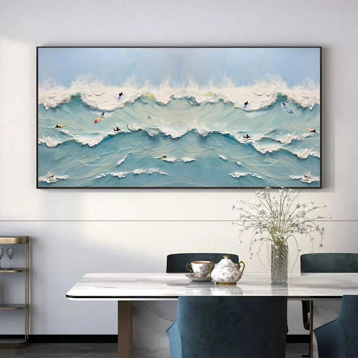 Liam O'Connell panoramic painting: surfers on textured blue ocean waves in living room decor.