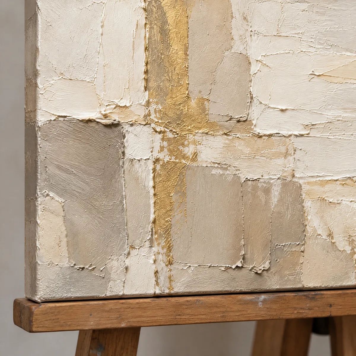 QUIET FRAMEWORK — Texture detail on an easel, no outer frame