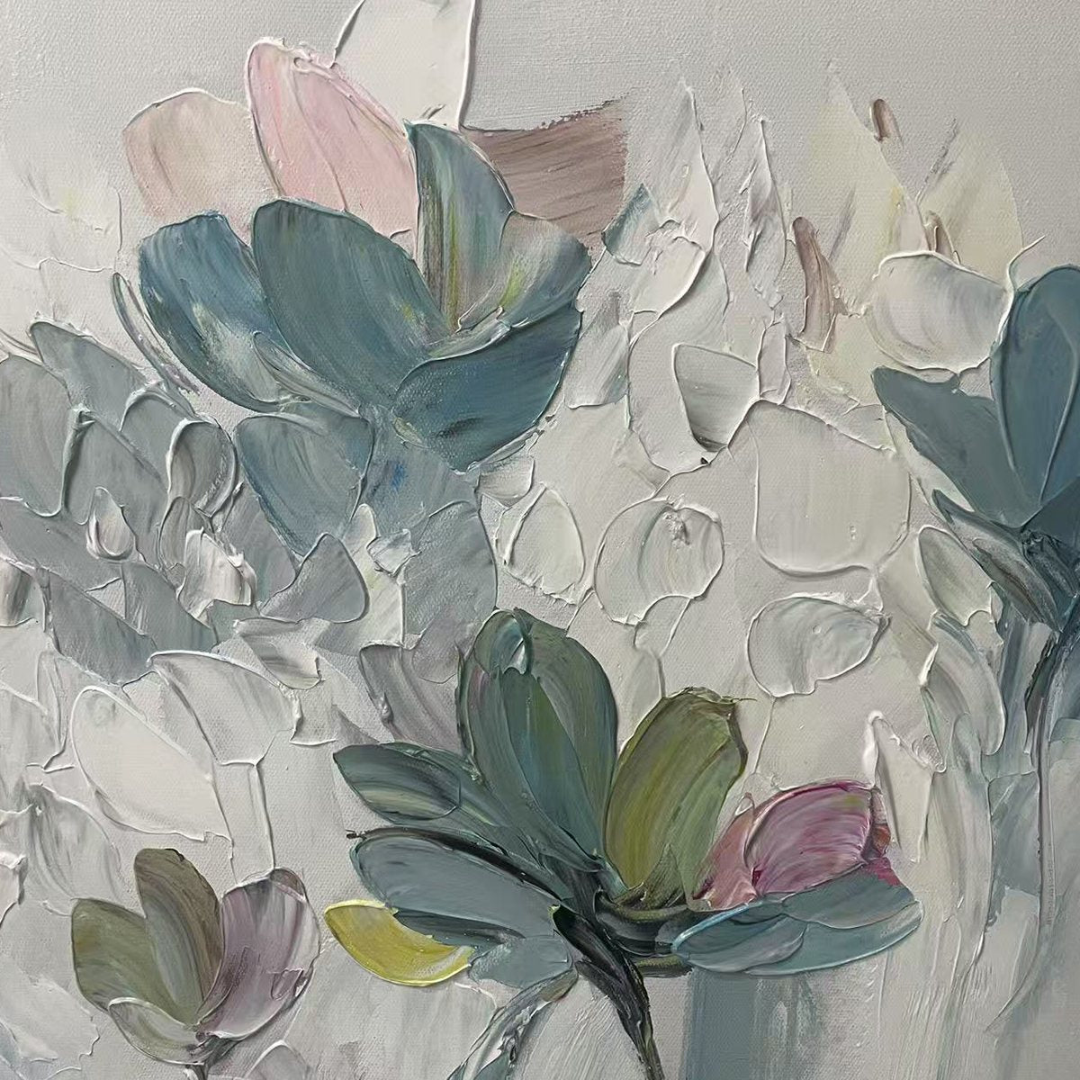 Close-up of Pastel Dream painting, showcasing thick impasto brushstrokes forming textured teal and pink flowers on canvas.