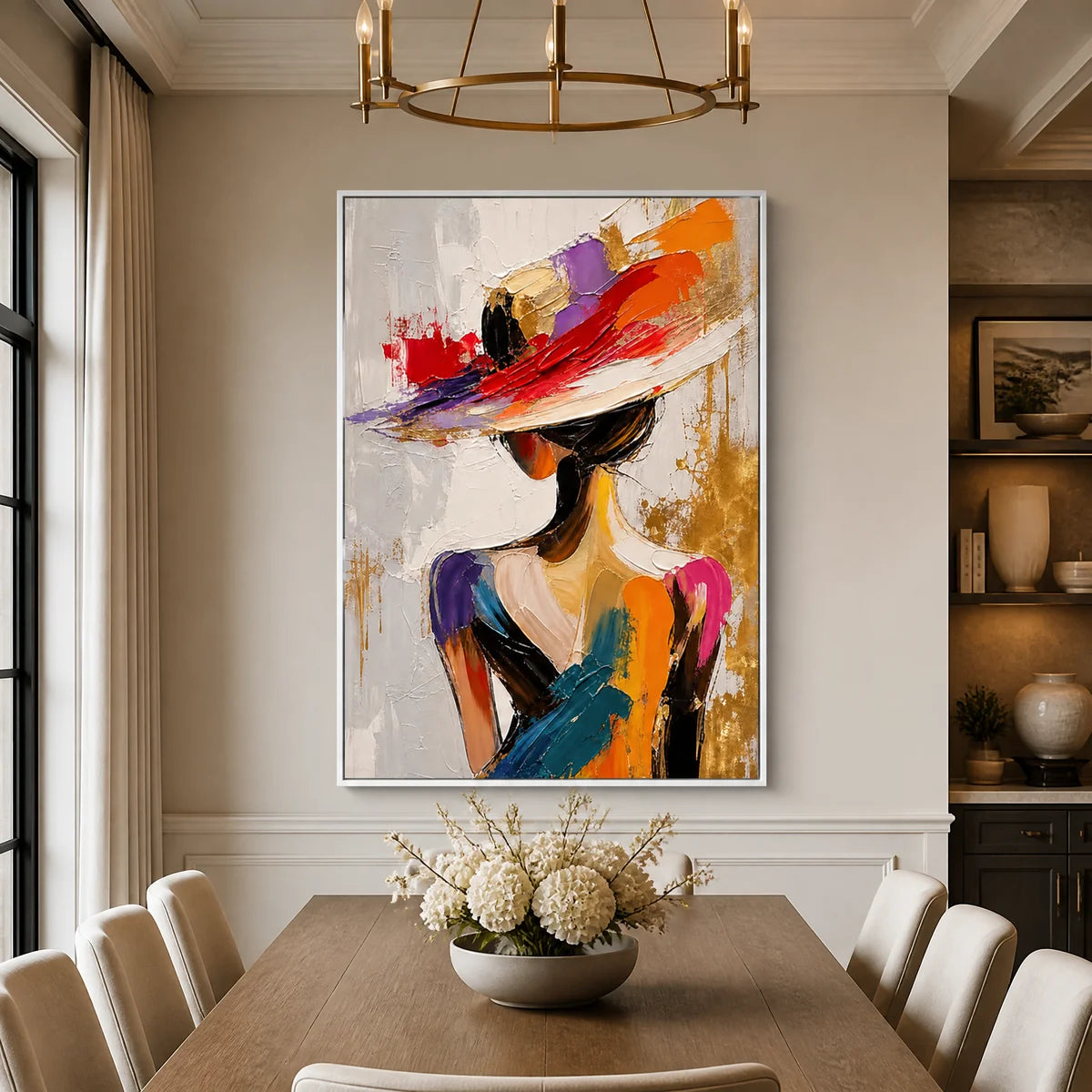 Elegant abstract portrait art of a woman in a hat with a white frame, featured as sophisticated wall decor in a modern dining room.