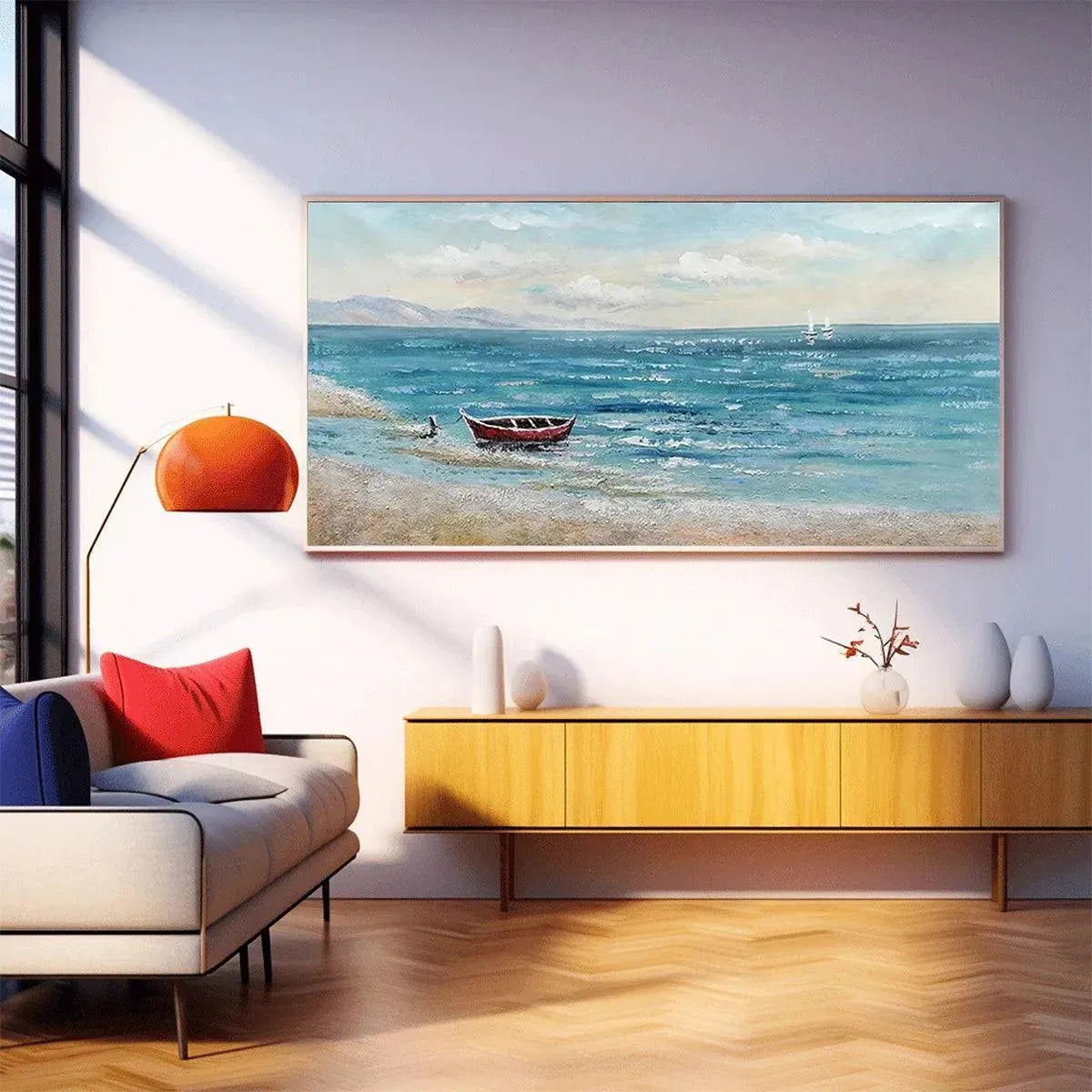 Red Boat at the Shore painting, a tranquil coastal scene, displayed in a modern living room over a yellow credenza.