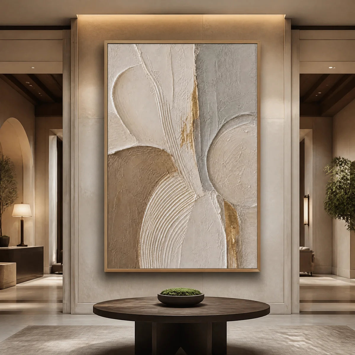 Textured abstract canvas art in wood frame, displayed in a luxury hotel lobby.