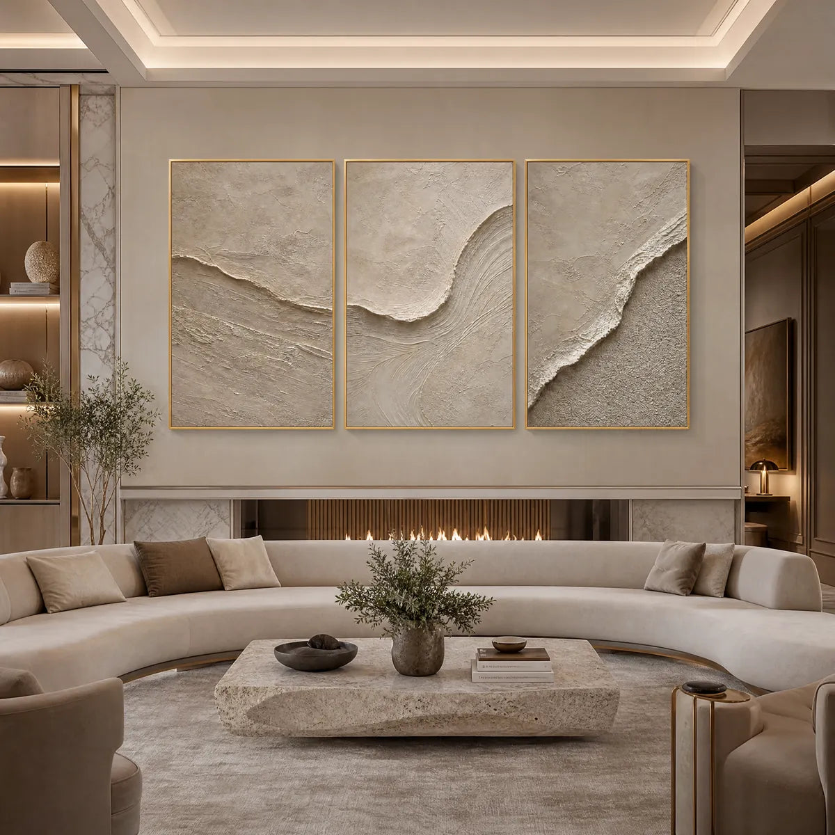 Textured beige Wabi Sabi wall art set of 3 above curved sofa in modern living room