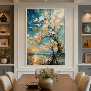 Modern abstract ocean landscape painting in white frame, showcased in a bright dining room.