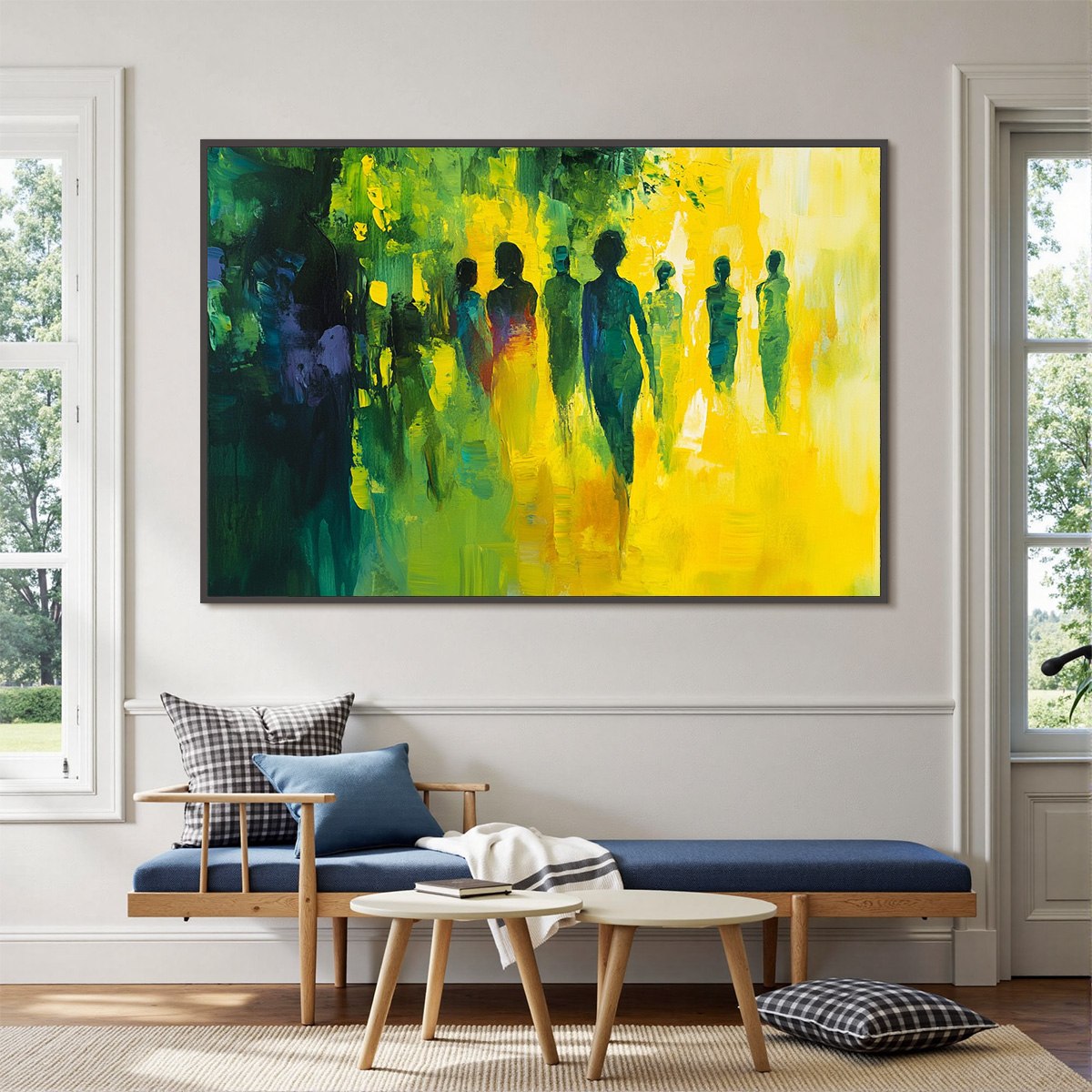 Abstract painting of silhouetted figures in green and yellow on a white wall above a living room setup.