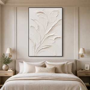 Ivory Botanical Relief in a refined bedroom with black frame