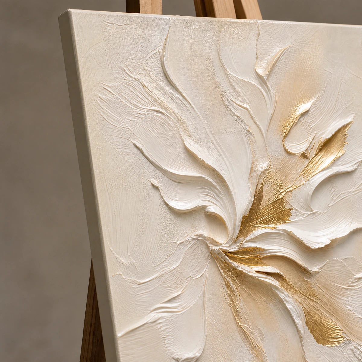 Close-up detail of Ivory Bloom Relief showing hand-painted texture and part of the frame