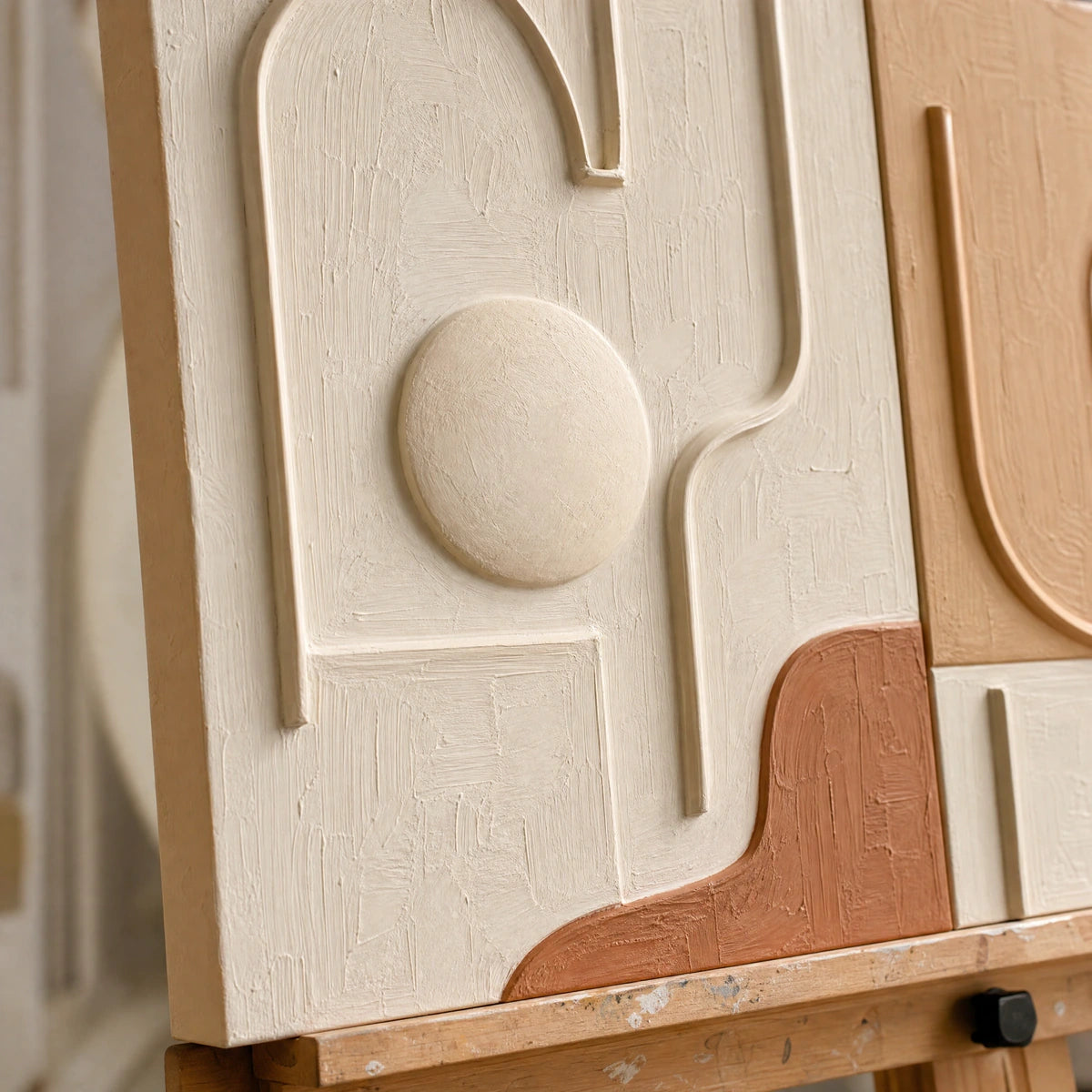 Close-up detail of Modern Relief Pair showing hand-painted texture and part of the frame