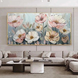Textured impasto painting of pink and white blossoms displayed in a modern living room above a sectional sofa.