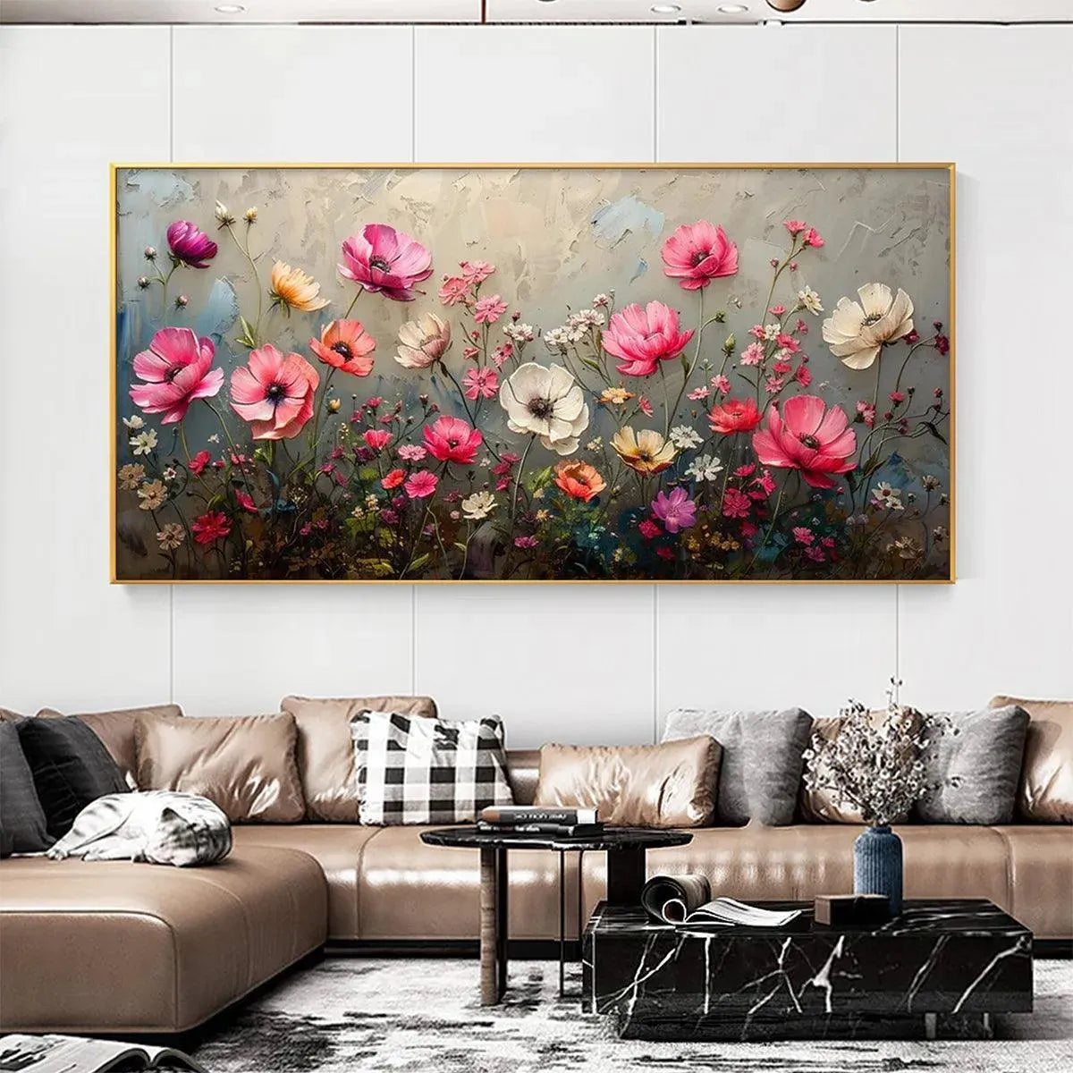 Textured impasto painting with pink, white, and red flowers in gold frame, displayed above a sofa.
