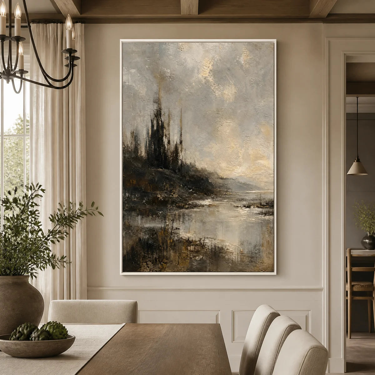Moody lake landscape oil painting with stormy light and golden-gray texture displayed in a refined dining room.