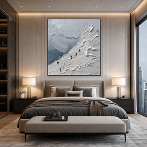 Textured impasto mountain oil painting wall art in gray and white above a modern bed