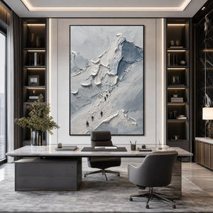 Textured acrylic mountain climbers wall art in a modern luxury office