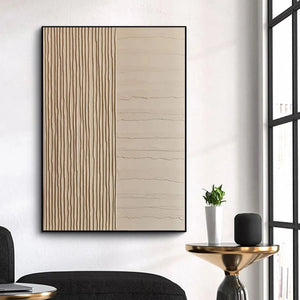 Minimalist textured beige painting by Javier Ramirez. Vertical and horizontal line design, gold frame, and modern interior.