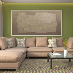 Javier Ramirez Textured Taupe Abstract painting above a beige sectional sofa, modern home decor, neutral tones, framed
