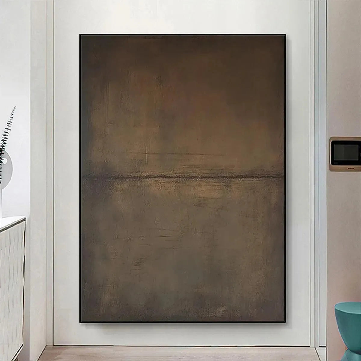 Umber Abstract Landscape by Liam O'Connell: Earthy-toned, minimalist abstract art in a black frame, perfect for home decor.