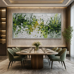 Verdant textured green and white abstract impasto painting above modern dining table