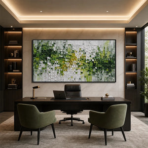 Textured green and white abstract impasto painting in a modern office