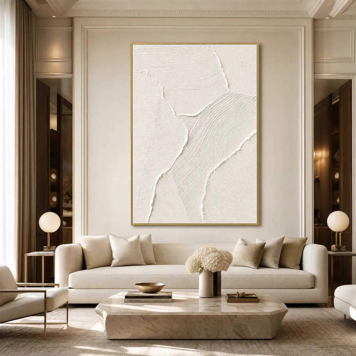 White textured Wabi Sabi abstract wall art in gold frame above cream sofa