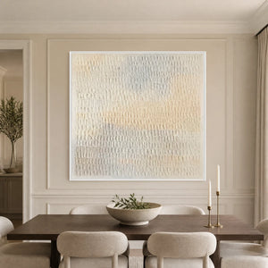 White textured minimalist abstract wall art in a white frame displayed in a refined dining room.