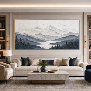 Textured monochrome mountain lake wall art above a beige sofa in a modern living room