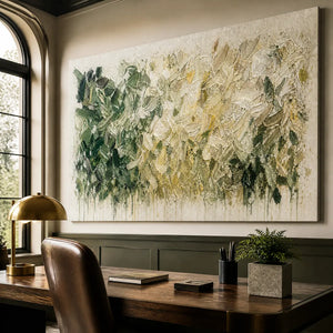 Large botanical abstract wall art with green and white impasto texture above a modern office desk.
