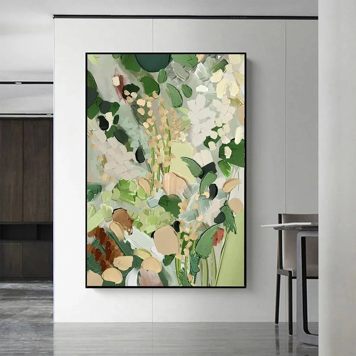 Textured abstract floral painting 'Whispering Meadow' in green, gold, white with impasto brushstrokes in modern interior.