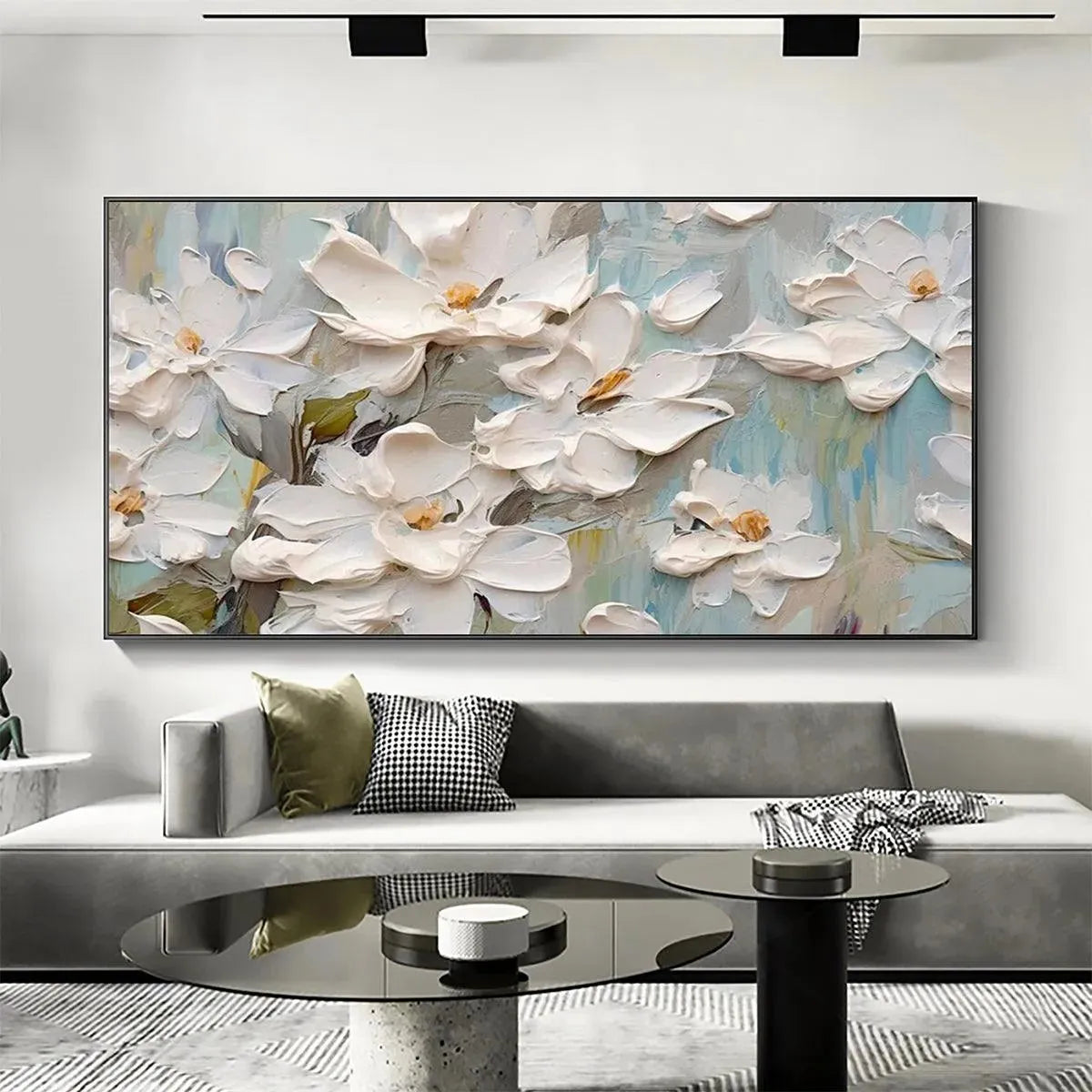 Textured white magnolia flowers panoramic wall art with impasto brushwork, soft blue-green abstract background.