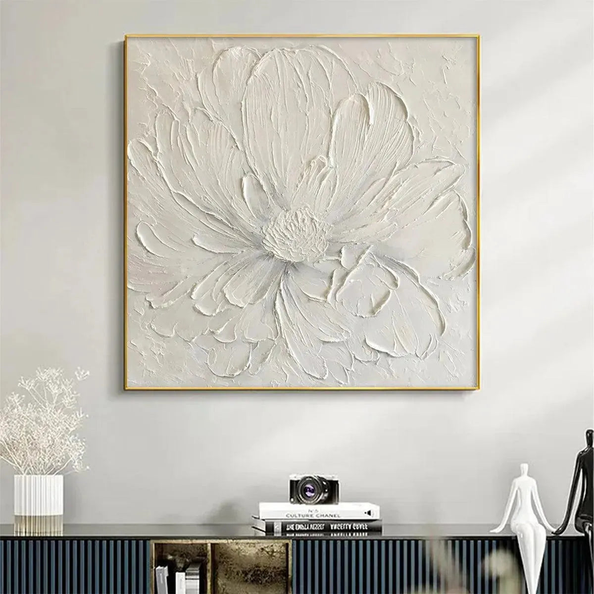 Elodie Dubois White Peony textured floral painting in a gold frame. Minimalist white impasto artwork for elegant home decor.