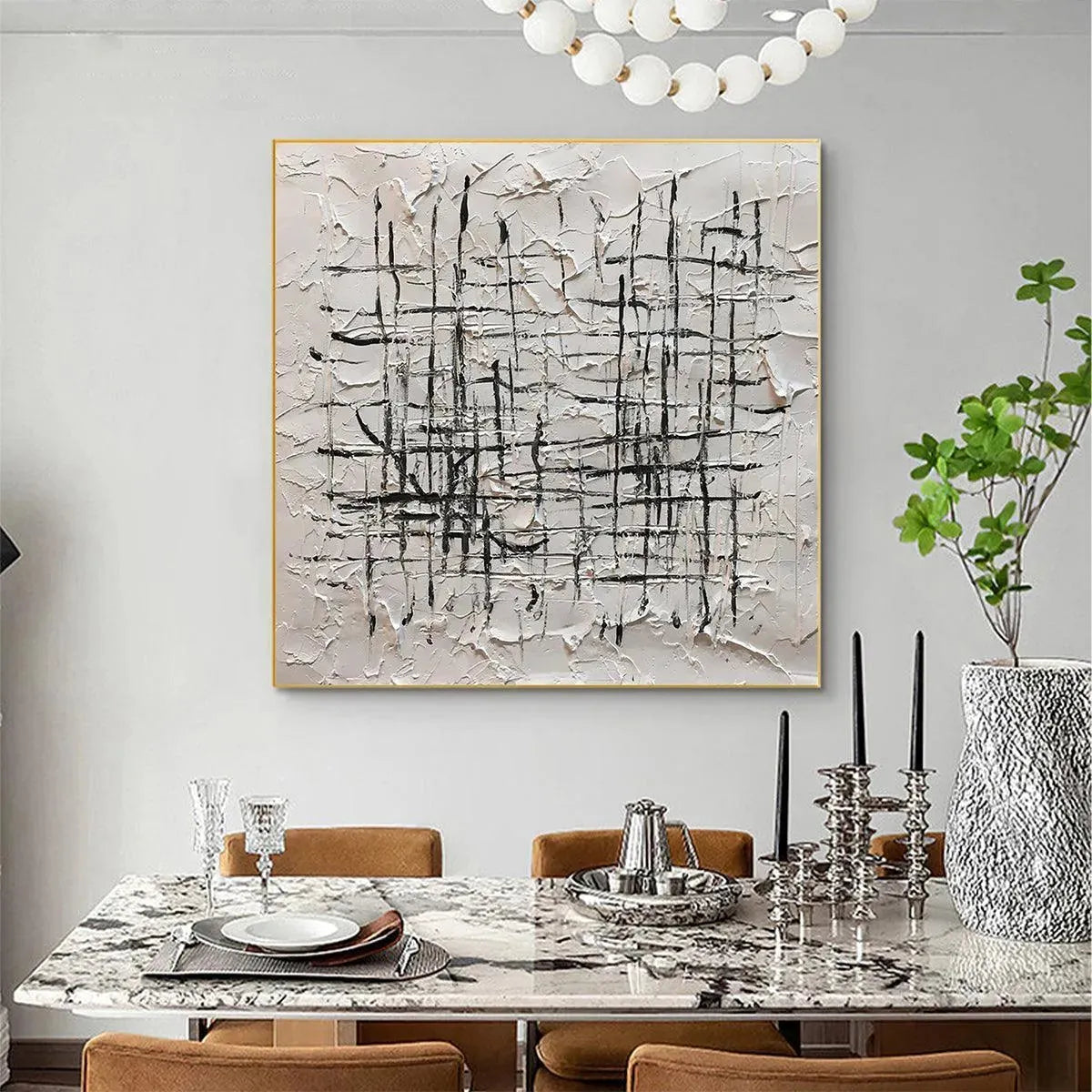 WOVEN LINES abstract painting by Javier Ramirez. Textured black and white canvas art, gold frame, modern minimalist style.